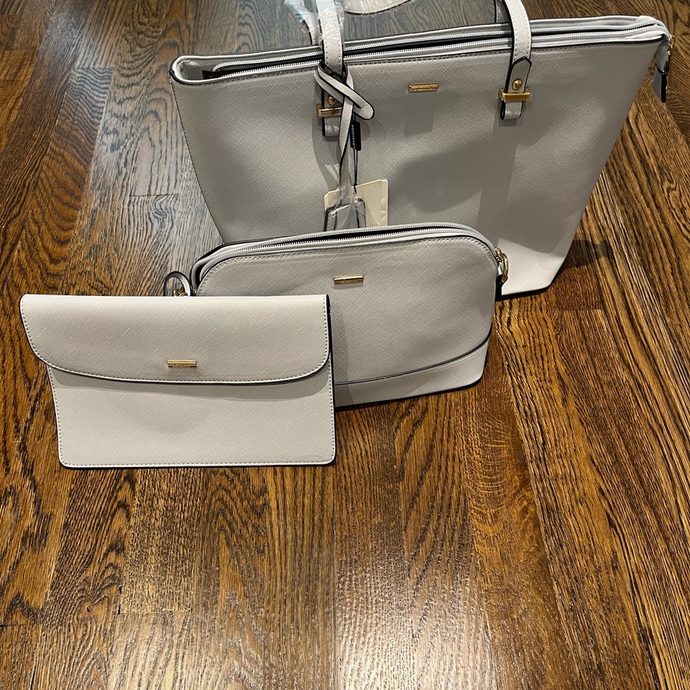 Brand new. Never used. Still has tags. Light blue.
